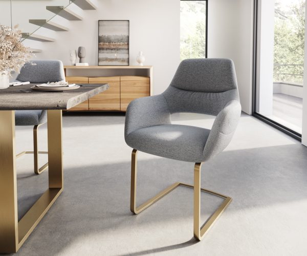 Jídelní židle Yago-Flex s područkou konzolová podnož plochá zlatá texturovaná tkanina světle šedá